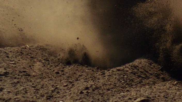 Rally car 705 Eric van Loon coming around the curve large cloud of dust kicked up behind him grid tile 7